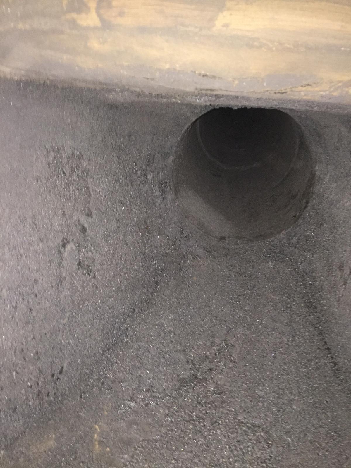 Chimney flue interior before professional sweep — Watmore's Woodburners, Norfolk